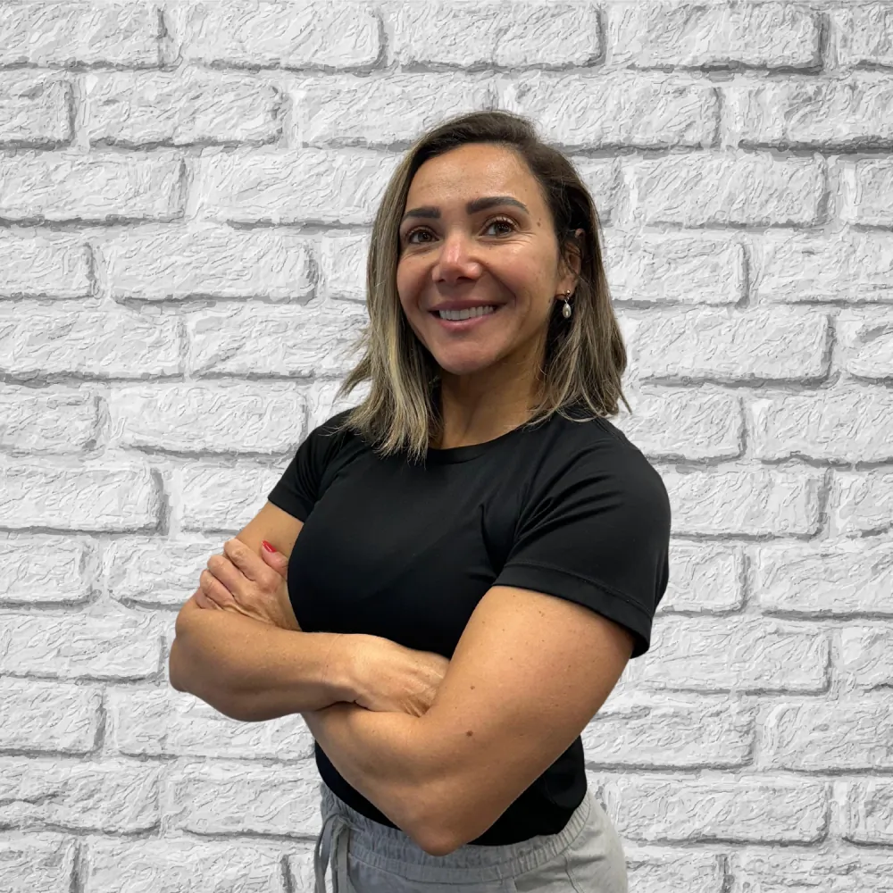 Rosely, personal trainer and Pilates instructor at Tribe Wellness Co